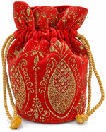 Red drawstring bag with gold pineapple decoration