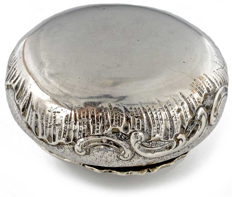 Gilded silver powder compact with puff