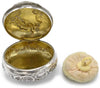 Gilded silver powder compact with puff