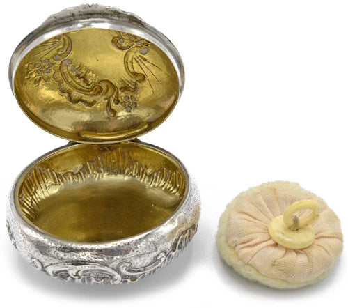 Gilded silver powder compact with puff