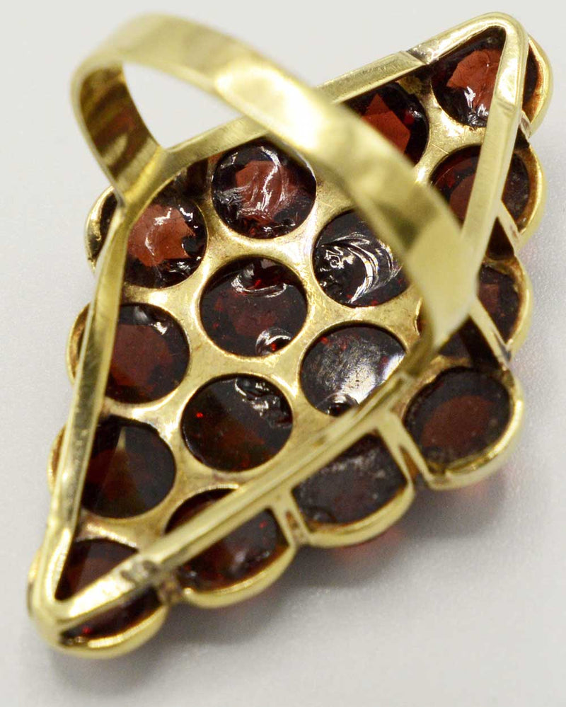 Antique garnet ring with gold band